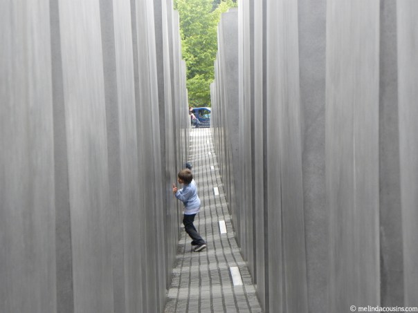 A young boy playing at the holocaust Memorial